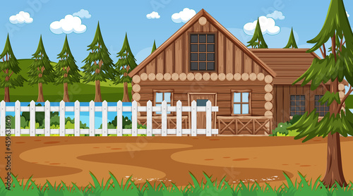 In front of wooden house in nature scene
