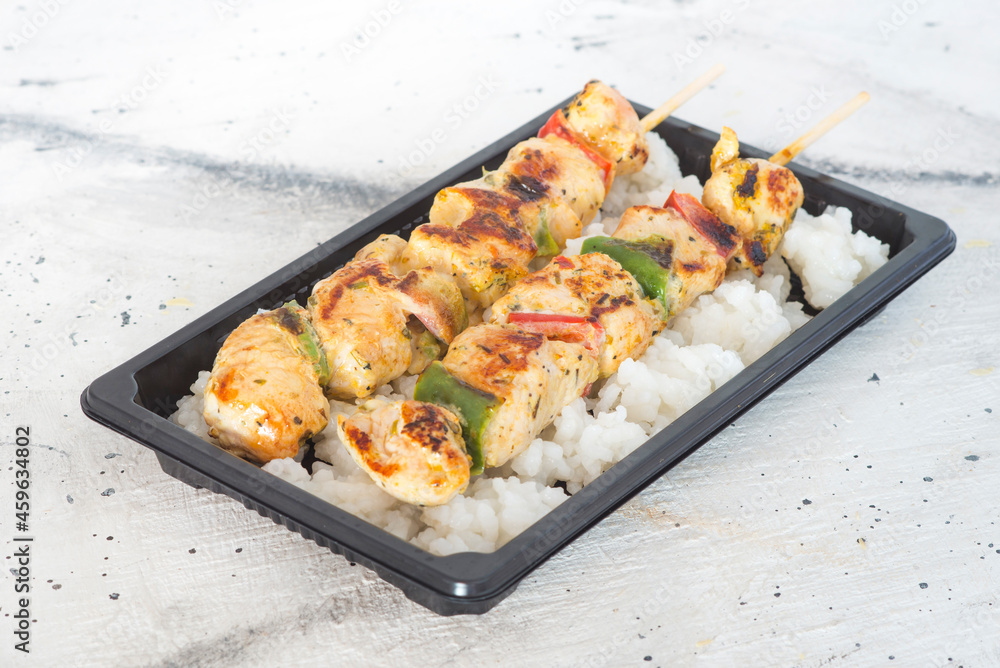 turkey skewer and rice condiment turkey skewer and rice condiment