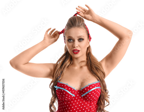 Sexy young woman on white b...