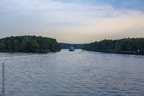 View of the picturesque river and wooded autumn coast
