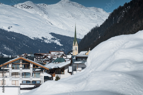 village view of Ischgl with snow and the church