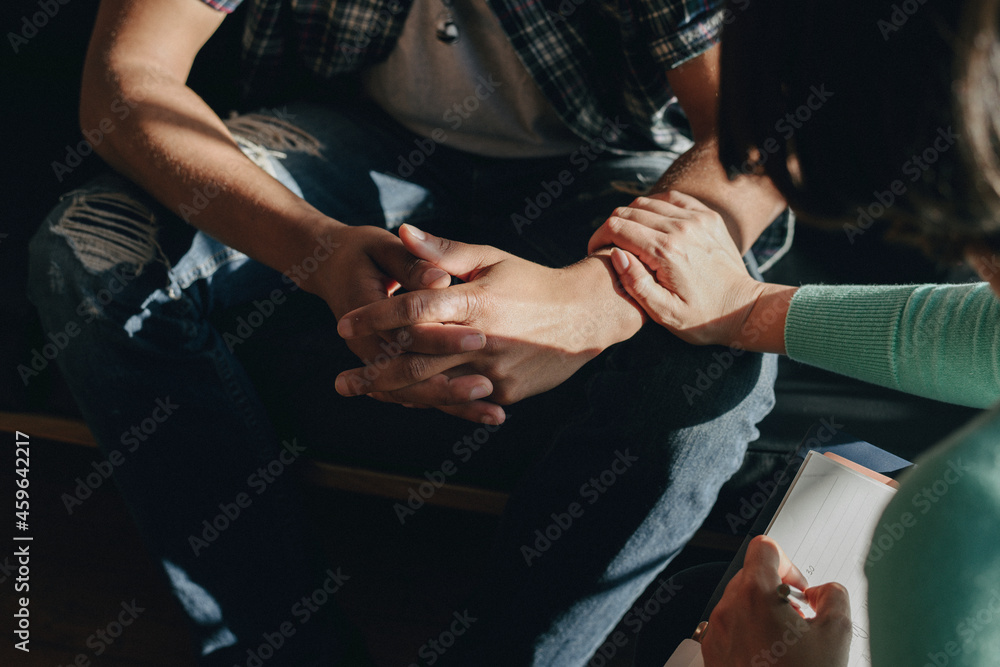 People support each other in a rehab session