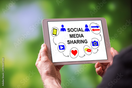 Social media sharing concept on a tablet