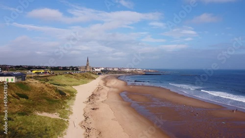 Aerial Shot of Tynemouth Long Sands Beach on a Warm Summer Day - Drone 4K HD Footage Rise Up photo