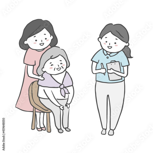 ケアマネージャーと話すシニア女性とその家族