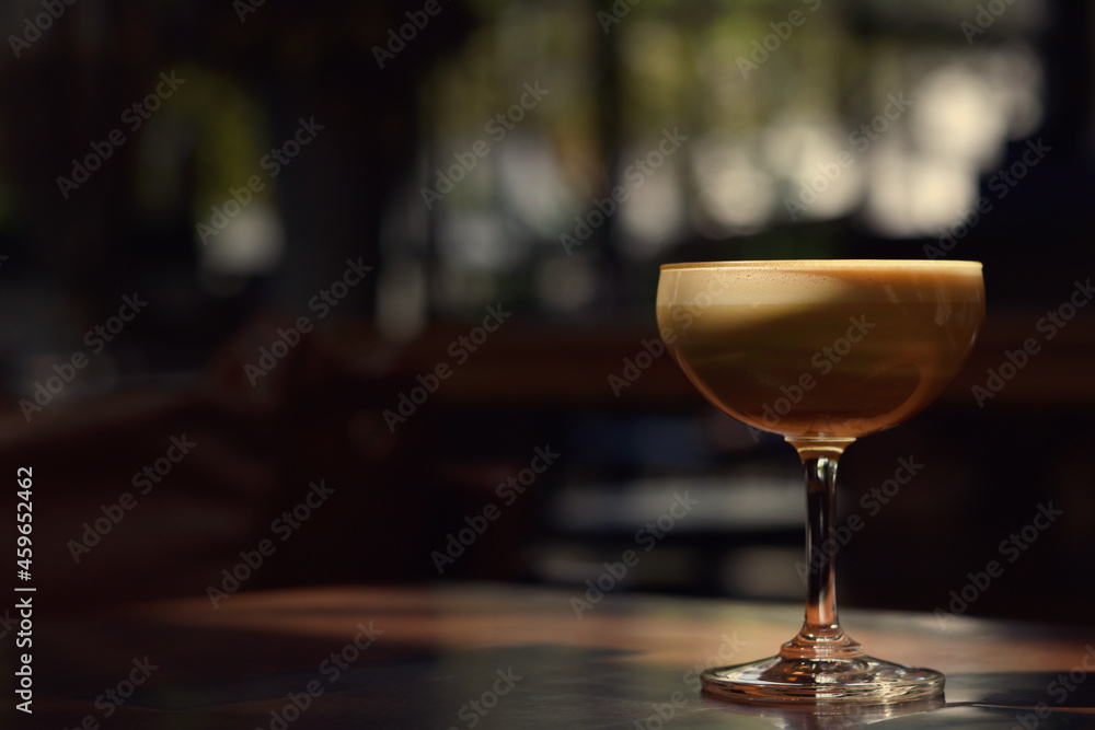 Warm coffee cup in a special tall glass with copy space. Warm coffee cup in a special tall glass with copy space.
