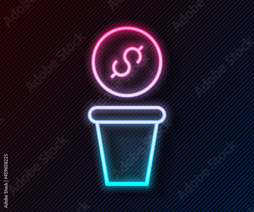 Glowing neon line Donation money icon isolated on black background. Hand give money as donation symbol. Donate money and charity concept. Vector