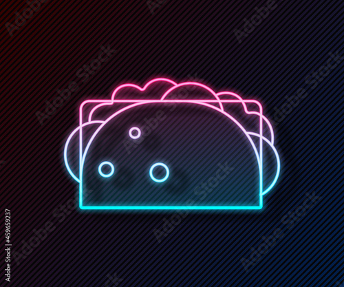 Glowing neon line Taco with tortilla icon isolated on black background. Traditional mexican fast food menu. Vector