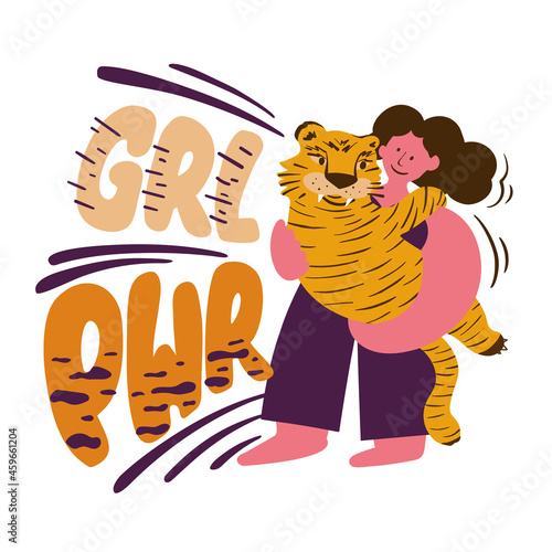 Woman  holding a tiger in her arms the symbol of the new 2022. Strong woman and big wild cat. Girl power