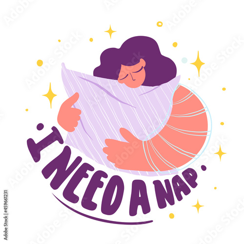 Woman with closed eyes hugs a large pillow and the inscription I need a nap