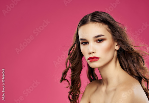 pretty woman bare shoulders luxury pink background