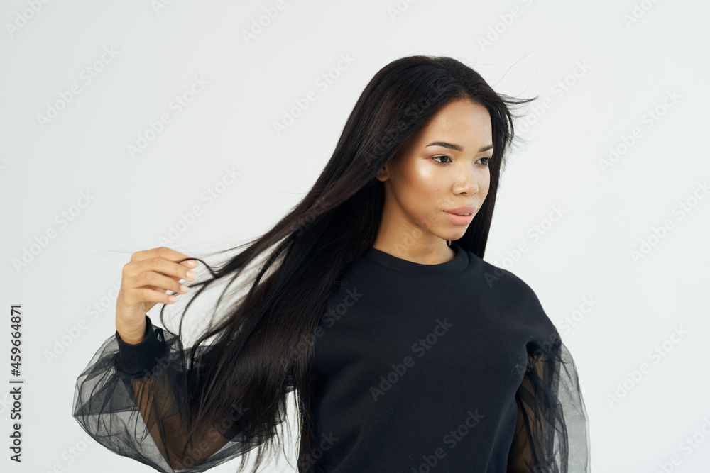 pretty woman attractive look close-up light background pretty woman attractive look close-up light background