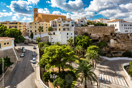 Spain, Balearic Islands, Mahon, View of Parc Rochina in summer with Casa Mir and Esglesia de Santa Maria de Mao in background