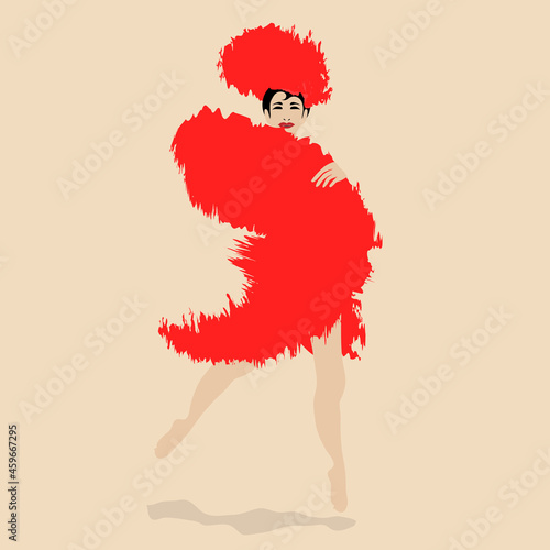 A showgirl poses in a feathery costume. photo