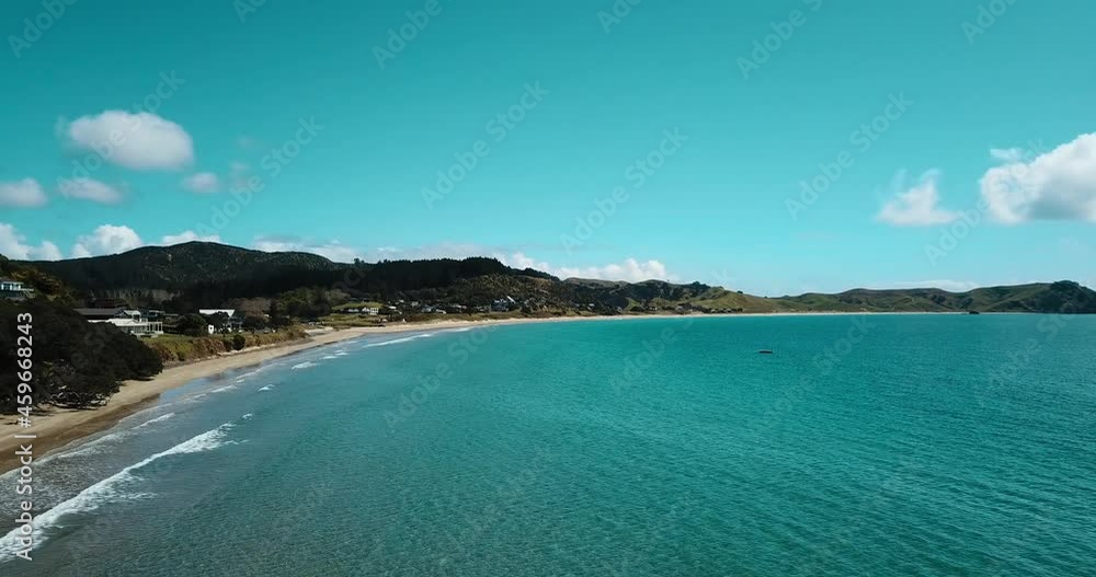 Aerial over beautiful Opito Beach in Summer holidays - Coromandel New Zealand Aerial over beautiful Opito Beach in Summer holidays - Coromandel New Zealand