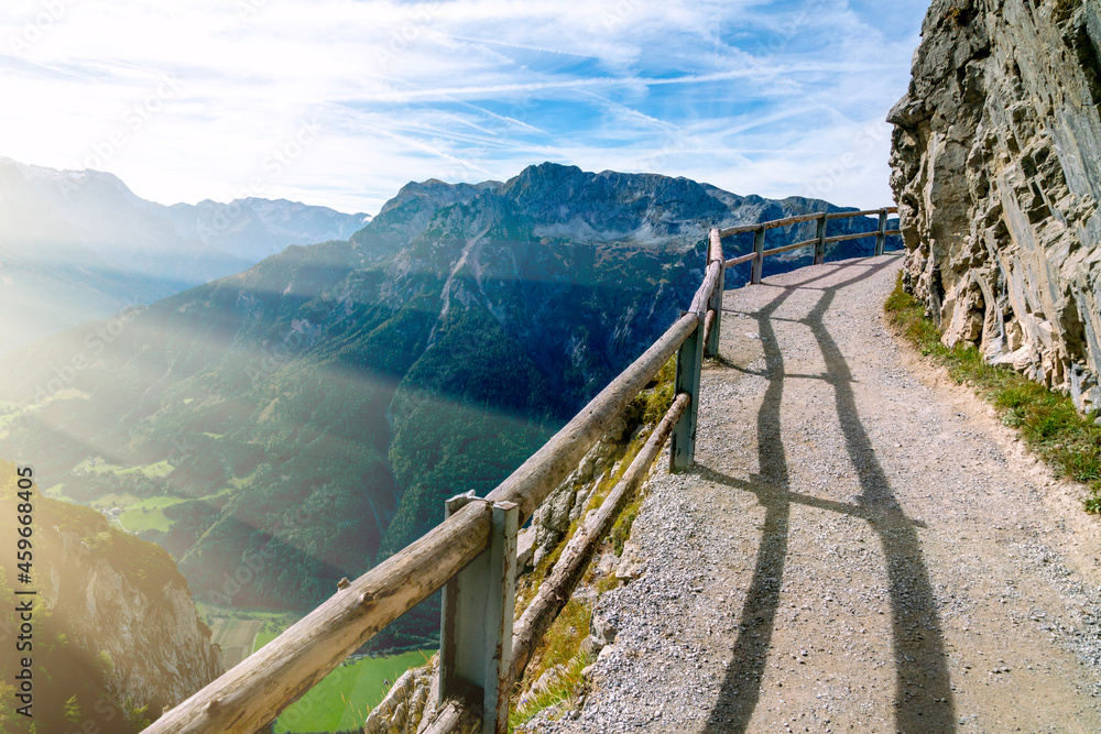 Equipped hiking path in the mountains. A beautiful summer