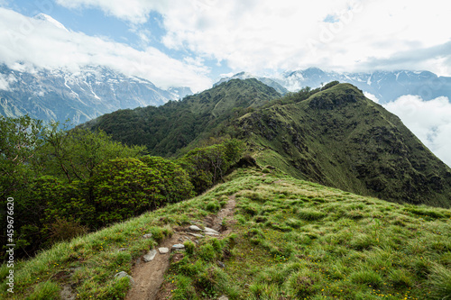 Narrow footpath on the mountain ridge. Trek to Machapuchare, Nepal photo