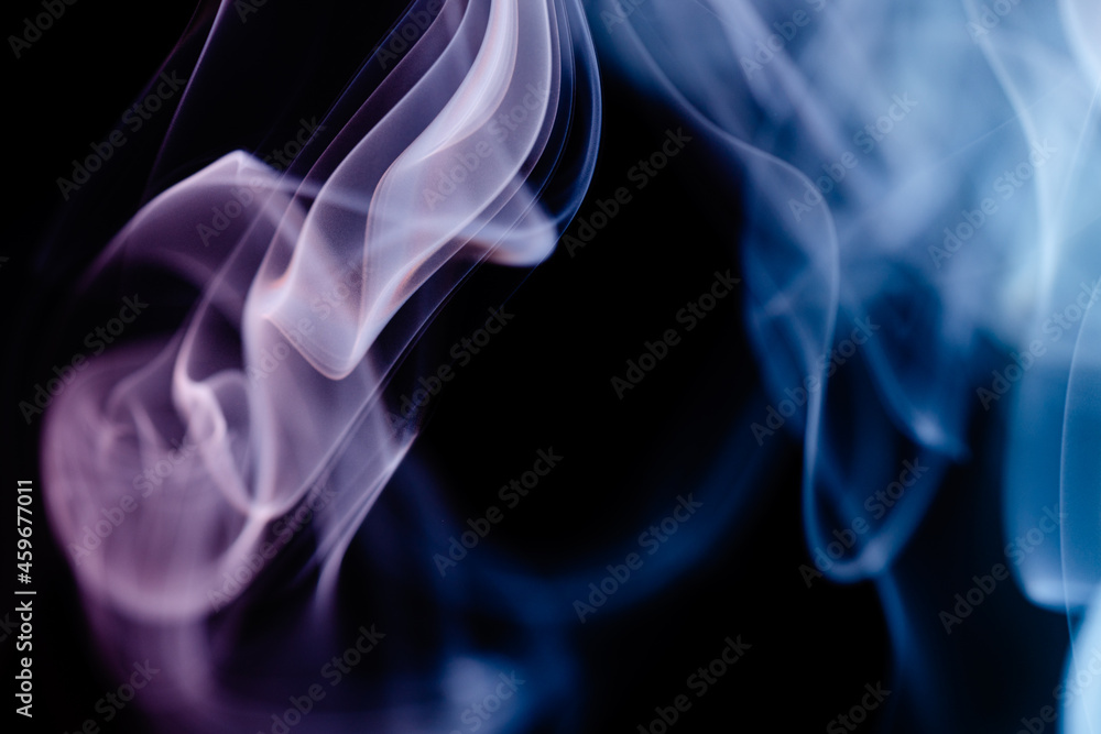 Abstract colorful smoke on a black background. Isolated. Abstract colorful smoke on a black background. Isolated.