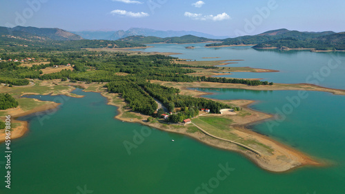 Aerial drone top down photo of beautiful artificial lake of Plastiras or Tavropos with wonderful nature and famous outdoor and water activities like canoe and water bike, Thessaly, Greece  photo