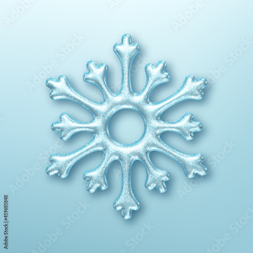 Three dimensional shiny snowflake on blue background. Design element for Christmas greeting card