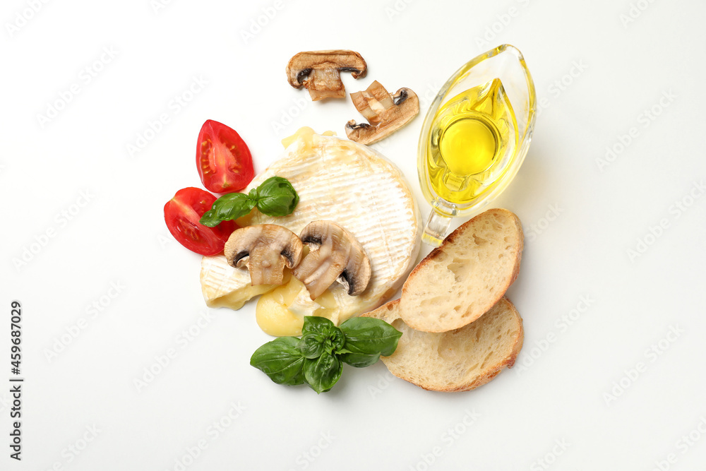 Concept of tasty food with grilled camembert on white background Concept of tasty food with grilled camembert on white background
