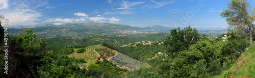 Aerial Panorama View To The Fertile Valleys Near Grasse In Provence France On A Beautiful Summer Day With A Few Clouds In The Clear Blue Sky