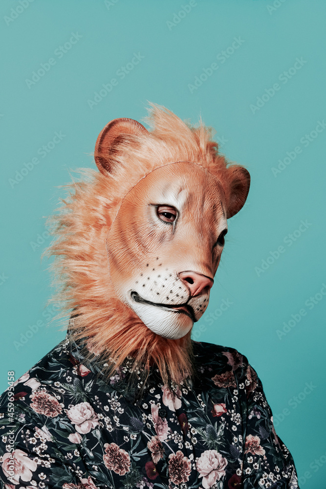 portrait of a man wearing a lion mask portrait of a man wearing a lion mask