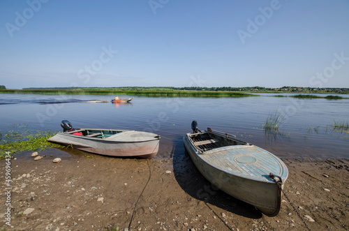 Boats on the banks of the Onega River. Country life. Russia, Arkhangelsk region 