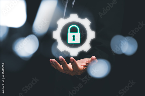Businessman hand holding digital padlock security interface to protect data, Internet network security concept, Cyber security network, Data protection privacy concept.