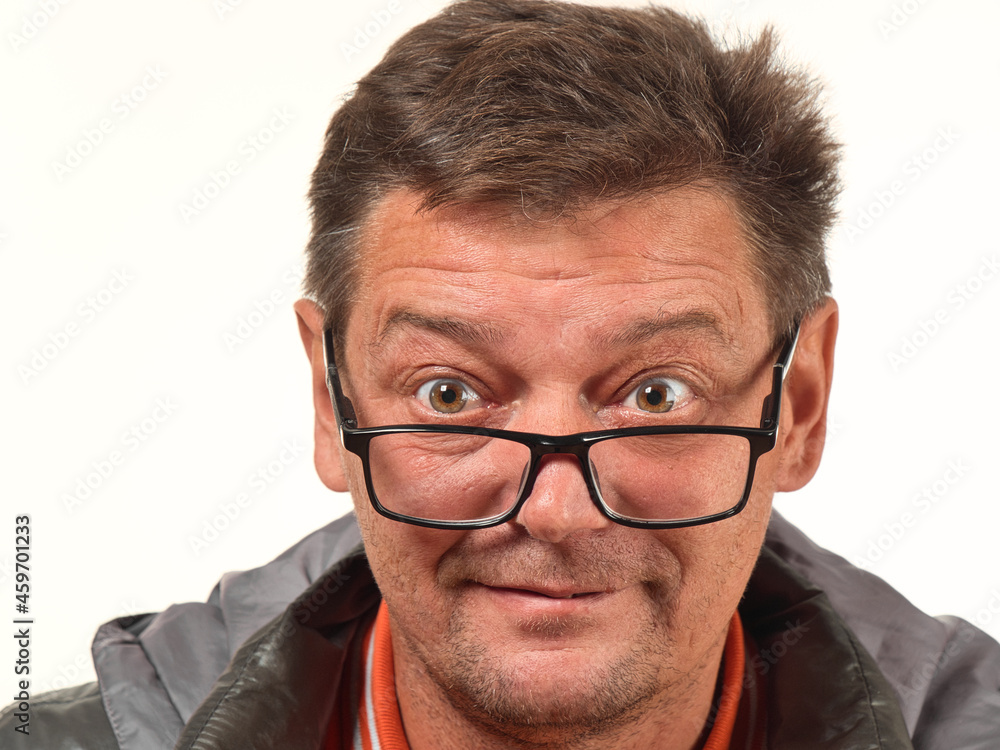old not shaved man in glasses with facial expressions close-up old not shaved man in glasses with facial expressions close-up
