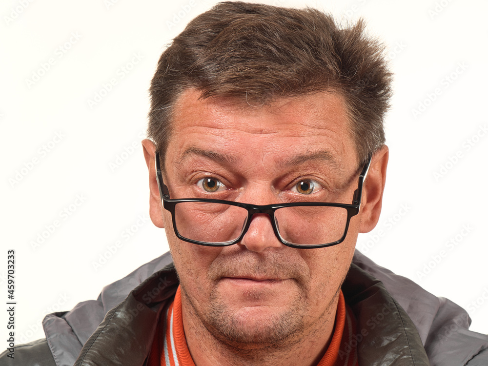 old not shaved man in glasses with facial expressions close-up old not shaved man in glasses with facial expressions close-up