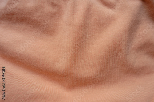 Jammed apricot colored simple cotton jersey fabric