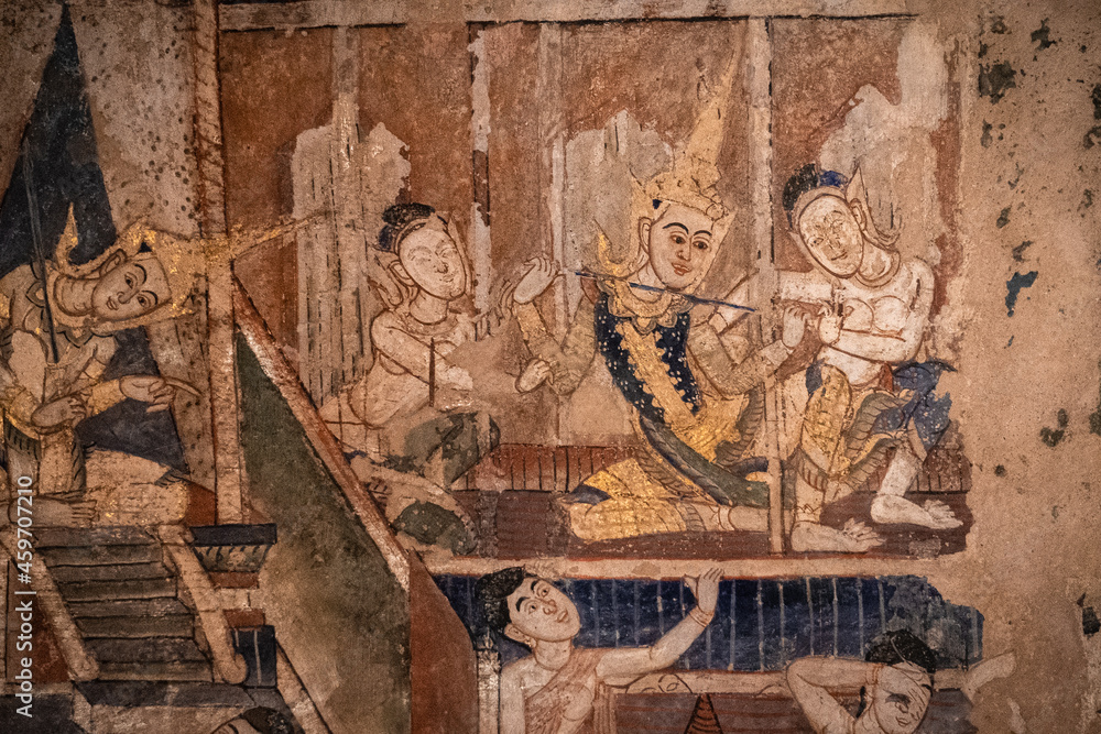 ancient Thai mural painting on wall in a temple in Chiang Mai Thailand