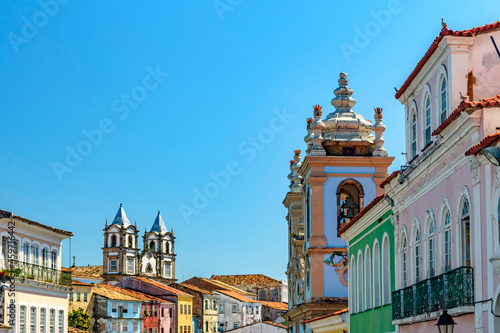Colorful facades and historic church towers in baroque and colonial style in the famous Pelourinho neighborhood of Salvador, Bahia