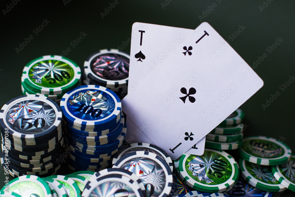 Obraz premium poker chips stack with two cards an ACE