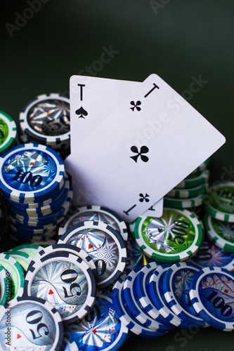 poker chips stack with two cards an ACE