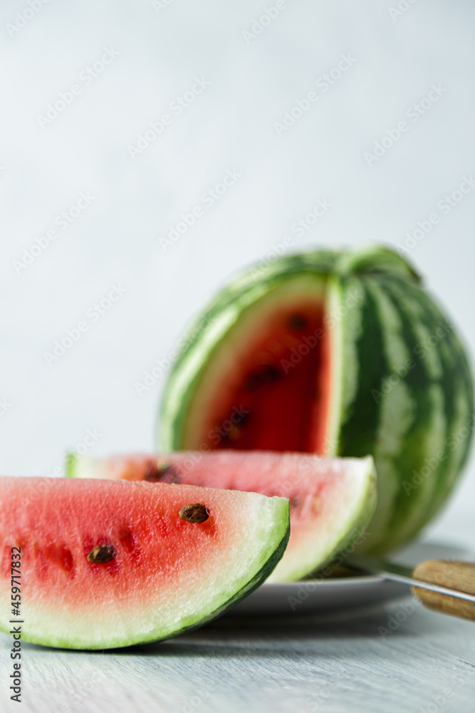 Waterelon, honey watermelon on wooden table background. Waterelon, honey watermelon on wooden table background.