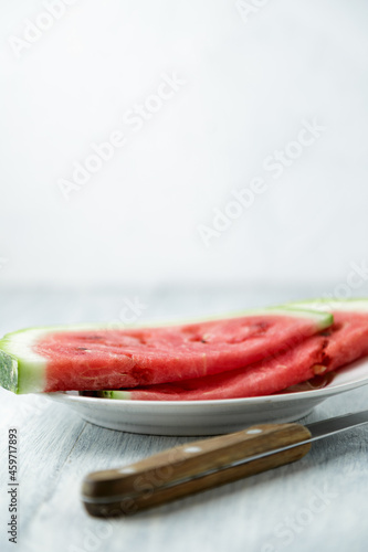 Waterelon, honey watermelon on wooden table background.