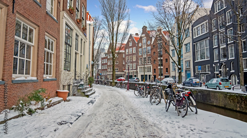 Photography City scenic from snowy Amsterdam in winter in the Netherlands