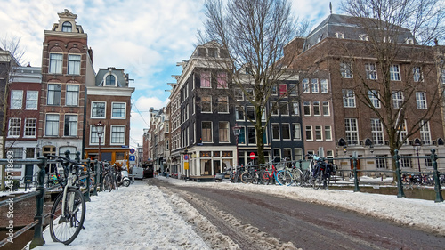 Photography City scenic from snowy Amsterdam in winter in the Netherlands
