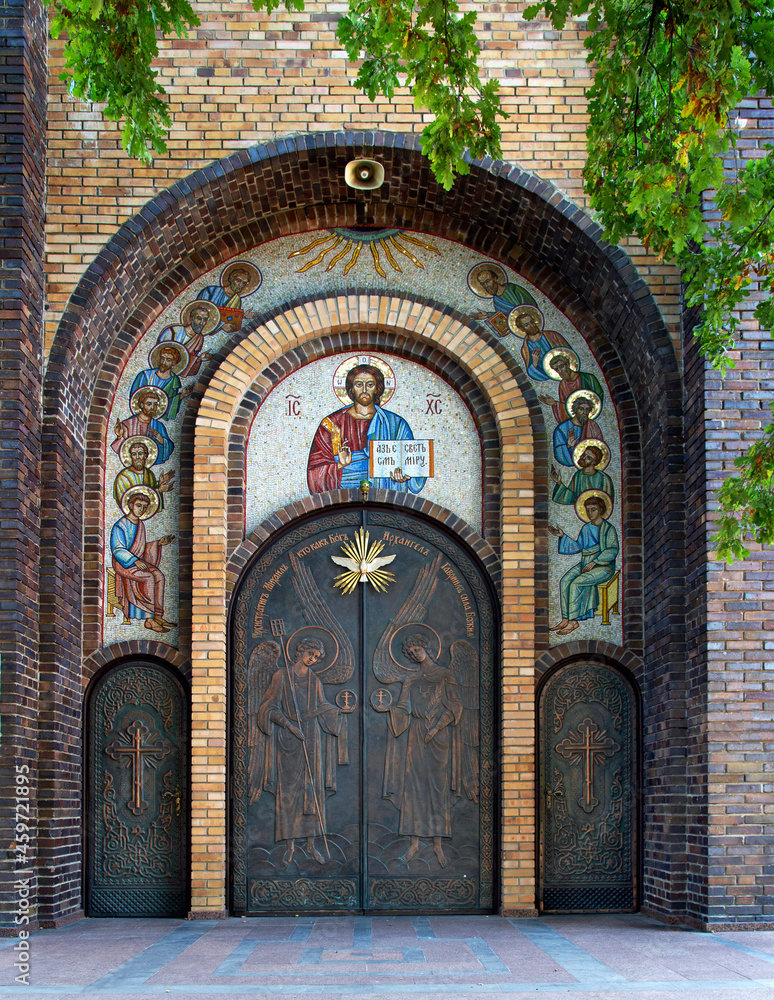 Obraz premium Built of brick in the 1980s, the Orthodox Church of the Holy Spirit, together with a free-standing brick belfry in the city of Białystok in Podlasie, Poland