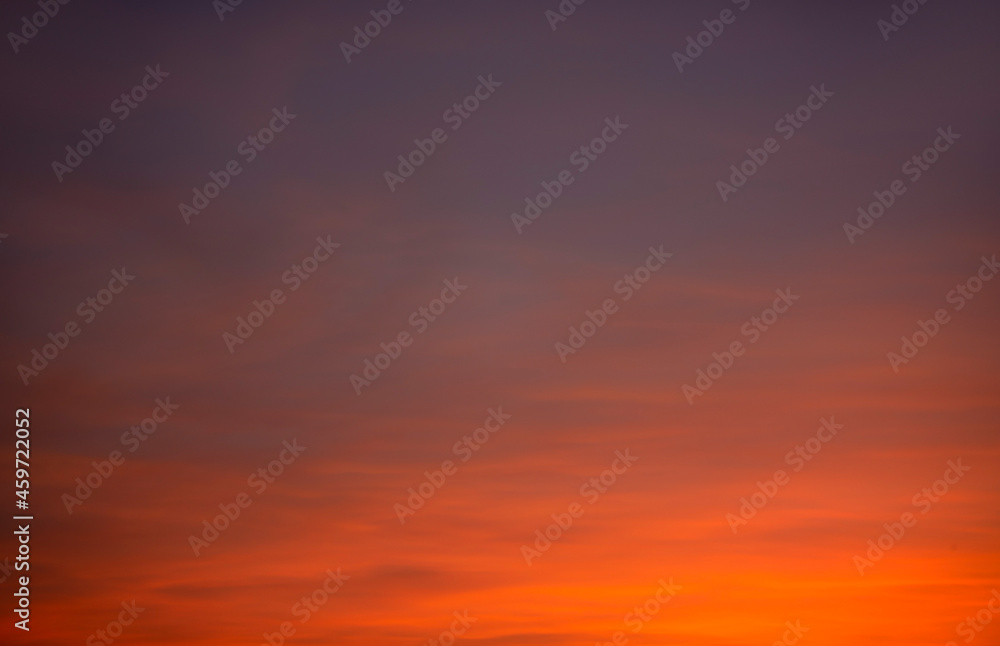This abstract purple orange sunset background is ideal as a background in a print production, advertisement or design..