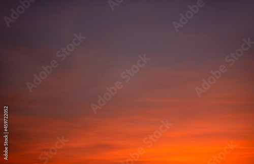 This abstract purple orange sunset background is ideal as a background in a print production, advertisement or design.. © Anurak