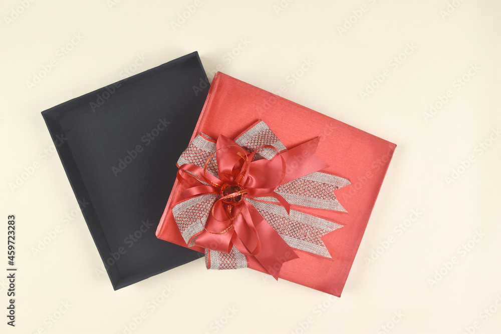 Gift box on orange space. Present for birthday, valentine day, Christmas, New Year concept. Gift box on orange space. Present for birthday, valentine day, Christmas, New Year concept.