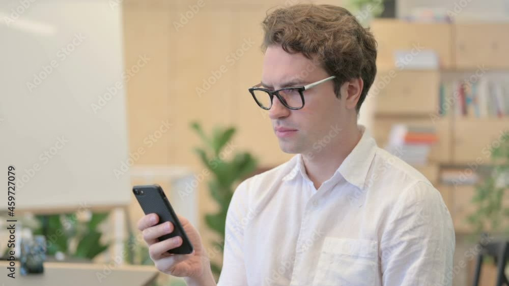Portrait of Young Man Using Smartphone Portrait of Young Man Using Smartphone