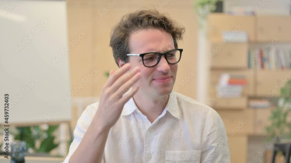 Portrait of Excited Young Man Reacting to Loss Portrait of Excited Young Man Reacting to Loss