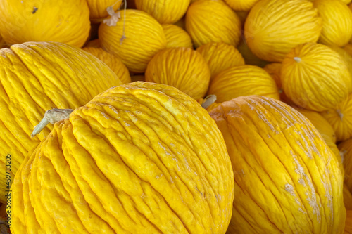 Sweet Sicilian yellow melons displayed in food market in Sicily
