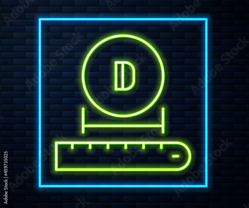 Glowing neon line Diameter icon isolated on brick wall background. Vector