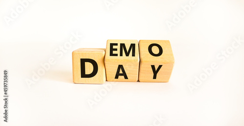 Demo day symbol. Turned wooden cubes with concept words 'demo day' on a beautiful white background. Copy space. Business and demo day concept.