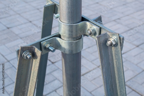 Mounting elements of metal structures on bolts and steel clamps made of galvanized steel.